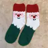 Calcetines de Navidad de coral de otoño e invierno, calcetines de suelo cálidos para el hogar de terciopelo medio, calcetines de Navidad de Papá Noel