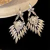 Brincos de Prata Europeus e Americanos com Pingente de Gota D'água Inlaid em Diamante Stud Brincos Leve Luxo Personalidade de Alta Qualidade Brincos da Moda Versátil Atacado