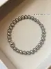 Pulseira deslumbrante de pérolas estilo francês para mulheres, novo modelo mais vendido de 2026, um acessório de luxo minimalista e versátil com um toque de alta qualidade