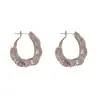 Pendientes de Metal Geométricos Huecos Retorcidos Personalizados de Moda Retro Transfronterizos Europeos y Americanos Pendientes Ligeros de Lujo Estilo Frío Simple para Mujeres