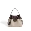 Bolso Cubo de Moda Color-Blocking 2026 de Nicho con Parches de Cuero Genuino, Bolso Versátil con Colgante de Poni, Bolso de Hombro Cruzado