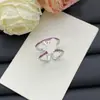 Anillo de Diseñador Nuevo Estilo Europeo y Americano Transfronterizo 2025 con Logo y Diseño Floral Incrustado de Diamantes para Mujer, Anillo Ajustable de Gama Alta al por Mayor