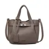 Bolsa para el trabajo, Lujo ligero de nicho estilo coreano 2026 Nueva moda, Bolso tipo cesta cubo, Bolso de mano retro simple para mujer