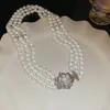 Collar Redondo Multicapa de Perlas y Cuentas Moda Temperamento Cadena para Suéter Elegante Lujo Ligero Sensación de Alta Gama Adorno de Collar Transfronterizo Europeo y Americano