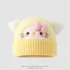 Gorro de protección para orejas de otoño e invierno, gorro infantil de moda con lazo, gorro de punto grueso de dibujos animados KT para niñas y niños mayores