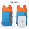 Mochila a color en stock, impermeable, ligera, de gran capacidad para viajes al aire libre, mochila escolar unisex para estudiantes, entrega directa al por mayor