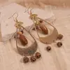 Pendientes Colgantes Geométricos Huecos Estilo Retro Europeo y Americano con Borlas de Gota de Agua Pendientes Bohemios Únicos de Nicho de Alta Gama para Mujeres