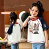 Camiseta Curta Color Block Estilo Menina de Hong Kong 2026 Verão Algodão Puro Raglan Meia Manga Tendência Top Bebê