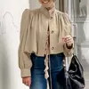 Outono 2026 Novo Estilo Britânico Transfronteiriço Curto Plissado Solto Gola Alta Manga Bufante Trench Coat Cáqui para Mulheres