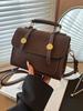 Bolso Cuadrado Pequeño de Mano Retro Transfronterizo para Mujer 2025 Nuevo Sentido de Alta Gama Bolso Casual de Hombro Cruzado para Viaje Bolso Comodín para el Día a Día