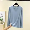 Nueva camiseta versátil de manga larga con cuello redondo de modal para primavera y otoño, una capa interior dulce y fina, un top cómodo para mujer