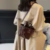 Bolso de moda de alta gama estilo vintage para mujer, bolso de mano de nicho de lujo ligero, versátil para el uso diario, bolso cruzado