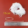 Etiqueta colgante de ropa de grano de alta calidad, cuerda colgante, etiqueta universal, etiqueta de bala universal, cuerda de algodón, hebilla, venta al por mayor