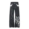 Calça jeans original masculina, marca de moda de rua, com retalhos de cores contrastantes, símbolos florais bordados e um design estiloso, calça casual de corte reto