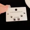 Set de aretes minimalista de moda de nicho, cuadrado y redondo negro, de tres piezas, con diseño único, aretes versátiles y compactos al por mayor
