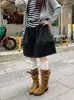 Falda de media longitud de cintura alta, con combinación de colores, muy recomendable para mujer en otoño e invierno. Falda tutú holgada, adelgazante y antiedad.