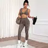 Nuevo conjunto de yoga sin costuras con estampado de leopardo europeo y americano transfronterizo, sujetador con efecto de melocotón en los glúteos, pantalones largos, ropa de yoga para fitness, conjunto deportivo