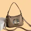 Nova Bolsa Feminina da Moda Transfronteiriça Primavera 2026 com Relevo de Elefante, Grande Capacidade, Versátil para o Dia a Dia, Bolsa de Ombro Cruzada Macia Estilo Retrô