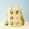 Monedero de silicona con forma de cueva cuadrada para niños, bolso cruzado para caminar, divertido y bonito bolso de silicona para cambio.