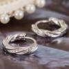 Nuevos aretes de diamantes negros diseño de anillo de Mobius temperamento moderno lujo ligero joyería para la oreja regalo de San Valentín para mujeres