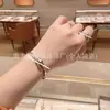 Pulsera de Hueso de Serpiente Totalmente Incrustada de Diamantes de Alta Gama Baojia para Mujer, Moda Europea y Americana de Lujo Ligero, Pulsera Abierta de Forma de Serpiente de Alta Gama