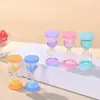 Adornos al por mayor alto sentido mini creativo temporizador de reloj de arena Macaron anticaída para niños adornos temporizadores de reloj de arena