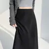 Foto real de falda midi color café para mujer, nuevo otoño 2026, falda de línea A de cintura alta vintage que cubre la cadera con dobladillo grande