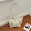 Conjunto de dos piezas de moda casual nuevo tejido de gran capacidad con diseño calado, bolso de hombro para el trabajo, bolso tote para llevar debajo del brazo