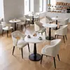 Mesa redonda de madera maciza estilo panadería con sillas tapizadas, diseño minimalista, adecuada para cafeterías, mesas de reuniones, sillas de comedor, ocio moderno y entornos de té de la tarde