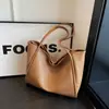 Bolsa feminina de grande capacidade transfronteiriça novo modelo 2026 bolsa de ombro simples versátil bolsa tote casual para o dia a dia bolsa de axila