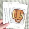 Linda pixel art de dibujos animados con un personaje pequeño y adorable; un patrón para arte con cuentas, un diseño de postal y materiales de referencia para crear artículos pequeños y encantadores