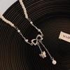 Collar de perlas con lazo de nuevo estilo para niñas, estilo Ins, ligero, lujoso, con diseño de borlas de nicho, delicado collar de clavícula de alta calidad.