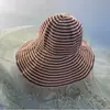 Nuevo sombrero de pescador a rayas blancas y negras transfronterizo para mujer, sombrero de sol plegable de verano, sombrero de ala ancha a la moda, sombrero tipo cubo