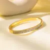 Europa y Estados Unidos nuevo brazalete de acero de titanio para niñas alta gama horno chapado en oro real acero inoxidable exquisito no se decolora mano de mujer