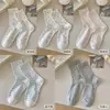 Calcetines antibacterianos, colección primavera/verano para mujer, hilo de algodón, calcetines de media pantorrilla, nuevo estilo 2026, populares calcetines blancos holgados para mujer