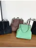 Bolsa Pequena Feminina Casual de Camurça e Pelúcia 2025 Novo Estilo Coreano Simples Bolsa de Ombro com Fecho Bolsa Transversal Pequena Quadrada