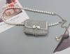 Bolsa de corrente de pérolas para mulheres verão 2021 Nova moda brilhante diamante mini bolsa quadrada popular bolsa mensageiro popular