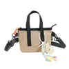 Mini Porta-Moedas Transfronteiriço para Mulheres 2025 Bolsa de Ombro Bolsa de Chave Bolsa de Fone de Ouvido Bolsa de Ombro Bolsa Transversal Casual para Homens