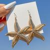 Pendientes Dorados de Estrella de Mar con Conchas Transfronterizos Europeos y Americanos Estilo Playa de Verano Estilo Vacaciones Sencillos y de Moda