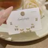 Versión Coreana Aguja de Plata S925 Una Tarjeta Tres Pares de Aretes Iridiscentes, Sensación de Lujo Ligero de Alta Gama, Aretes Nicho Versátiles Frescos de Verano