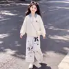 Conjunto de dos piezas versátil para niñas estilo coreano, top de cuadros patchwork con cuello para primavera y otoño con elegante ribete de encaje y pantalones casuales
