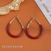 Pendientes de gota de aceite rojos de moda Ancola, con un sentido avanzado de la moda, círculo ovalado atmosférico, Internet, viento rojo, pendientes distintivos de color a juego.