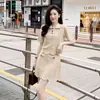 Traje Casual da Moda para Mulheres, Estilo Verão, Top Jacquard Vazado de Manga Curta, Saia Curta, Conjunto de Duas Peças Tricotado