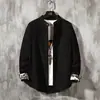 Camisa larga de manga larga para hombre con bordado de grulla, diseño de polvo dorado de otoño, corte holgado, versátil, prenda exterior casual estilo chino, 2026