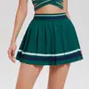 Conjunto Esportivo de Tênis Estilo Old Money Cai Jue para Mulheres com Sutiã Integrado, Saia Plissada Cruzada na Cintura, Roupa de Badminton Anti-Exposição