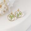 Aretes exquisitos de flor real de venta caliente transfronteriza resina gota pegamento joyería de flor seca aretes nomeolvides joyería artesanal al por mayor