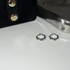 Clavo de Hueso de Oreja Cruz Negra Punk Pendientes de Estrella Vieja Retro Pendientes de Nicho Dulce Fresco Diablo Europeos y Americanos
