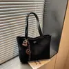 Bolsa de mano minimalista transfronteriza, nuevo estilo 2026, gran capacidad, bolso de hombro moderno, texturizado, casual y adecuado para el trabajo, se puede llevar debajo del brazo
