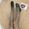 Venta al por mayor de medias de rejilla sexys y seductoras de tallas grandes con varios diseños, incluyendo medias de rejilla estampadas y medias transparentes