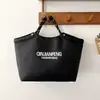 Bolso de Gran Capacidad Estilo Coreano Diseño de Nicho Bolso Moda Nueva Primavera 2026 Bolso de Tela Simple Ligero para Mujeres